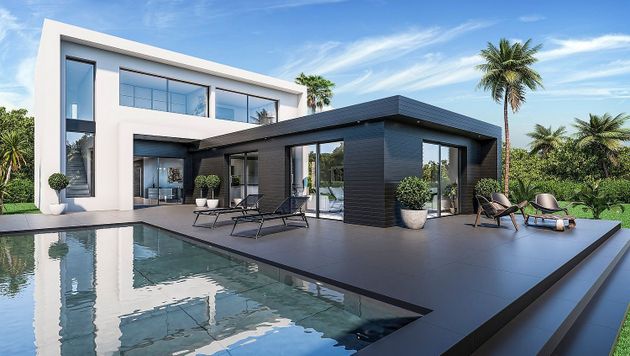 Foto 2 de Casa nova en venda a calle Leonardo Da Vinci de 3 habitacions amb piscina i jardí