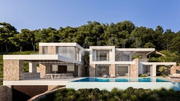 Foto 2 de Casa nueva en venta en calle Blauet de 4 habitaciones con piscina y jardín