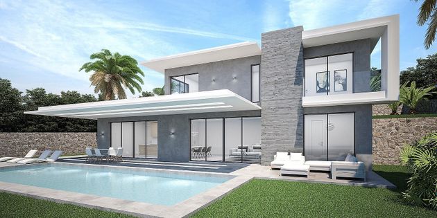 Foto 2 de Casa nova en venda a calle Leonardo Da Vincci de 3 habitacions amb piscina i jardí