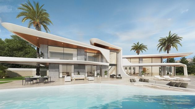 Foto 1 de Casa nova en venda a calle Leonardo Da Vincci de 5 habitacions amb piscina i jardí