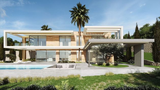 Foto 1 de Casa nova en venda a calle Leonardo Da Vinci Cansalades de 3 habitacions amb piscina i jardí