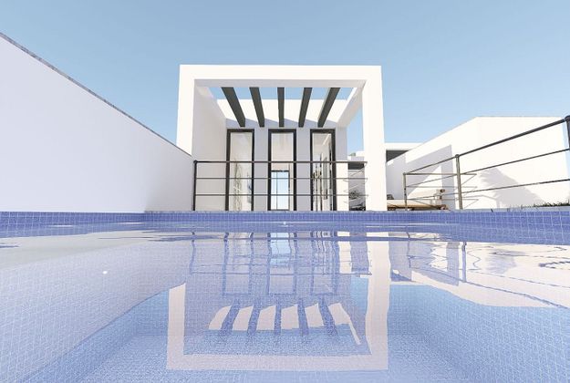 Foto 2 de Venta de casa nueva en calle Playa Cortijo Amaya de 2 habitaciones con piscina y jardín