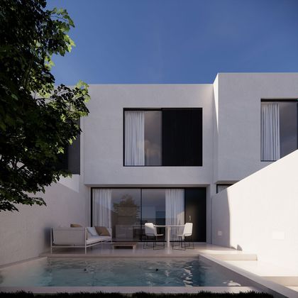 Foto 1 de Casa nova en venda a calle Las Cuadras de 3 habitacions amb jardí