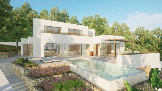 Foto 1 de Casa nova en venda a calle Mar Norte de 4 habitacions amb piscina i jardí