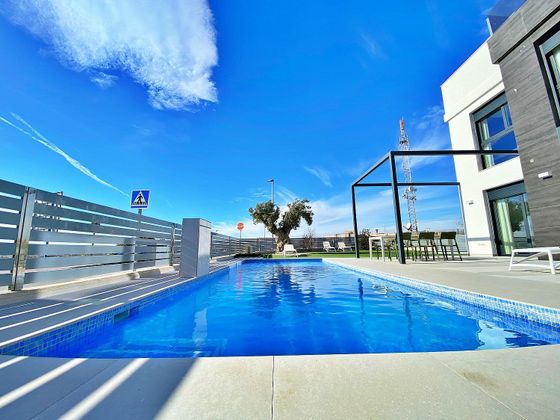 Foto 1 de Venta de casa nueva en calle Partida Cotoveta de 3 habitaciones con piscina y jardín