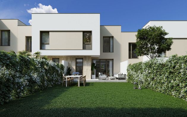 Foto 1 de Casa nova en venda a calle Indalecio Prieto de 3 habitacions amb jardí