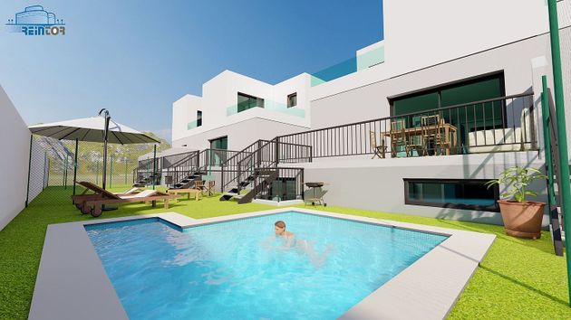 Foto 2 de Casa nova en venda a calle Valle del Paular de 4 habitacions amb jardí