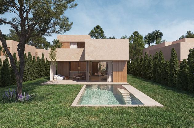 Foto 2 de Casa nova en venda a calle Calabria de 4 habitacions amb piscina i jardí