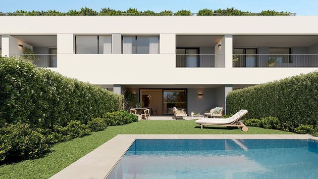 Foto 1 de Casa nova en venda a calle Cabo de Palos de 4 habitacions amb piscina i jardí