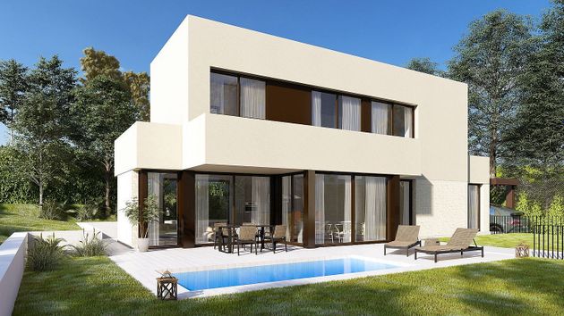 Foto 1 de Casa nova en venda a calle Riu de Bitlles de 4 habitacions amb piscina i jardí
