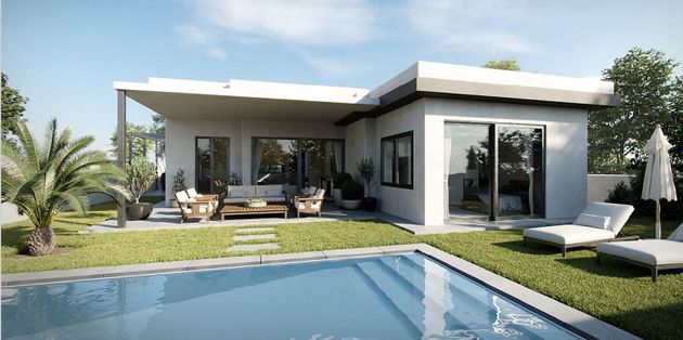 Foto 2 de Casa nova en venda a calle De la Pañoleta de 4 habitacions amb jardí i aire acondicionat