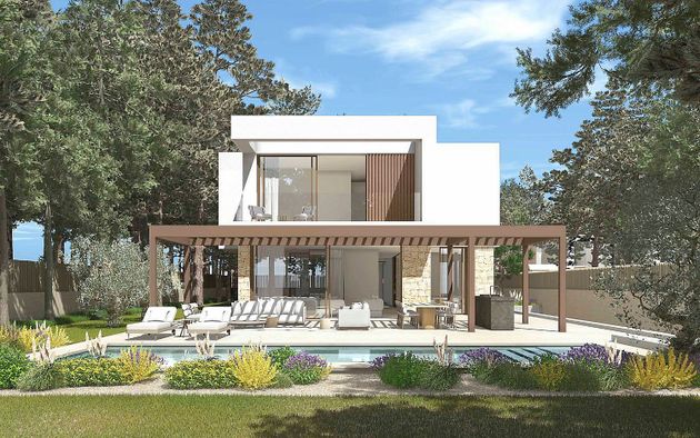 Foto 1 de Casa nueva en venta en calle Unicorni de 4 habitaciones con piscina y jardín