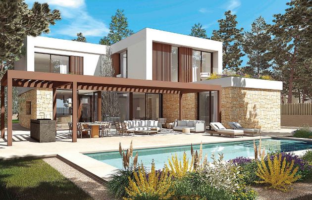 Foto 2 de Casa nova en venda a calle Unicorni de 4 habitacions amb piscina i jardí