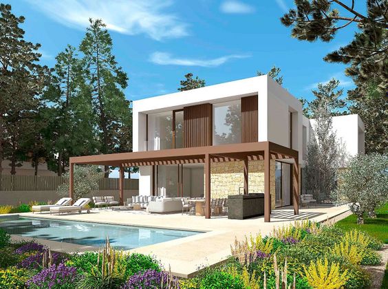 Foto 1 de Casa nueva en venta en calle Unicorni de 4 habitaciones con piscina y jardín