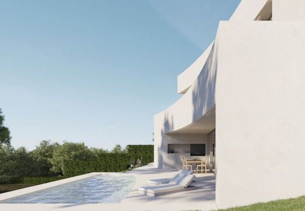 Foto 1 de Casa nova en venda a calle Azhar de 4 habitacions amb piscina i jardí
