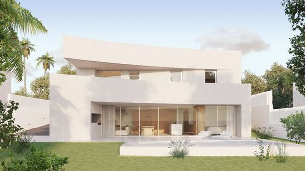 Foto 2 de Casa nova en venda a calle Azhar de 4 habitacions amb piscina i jardí