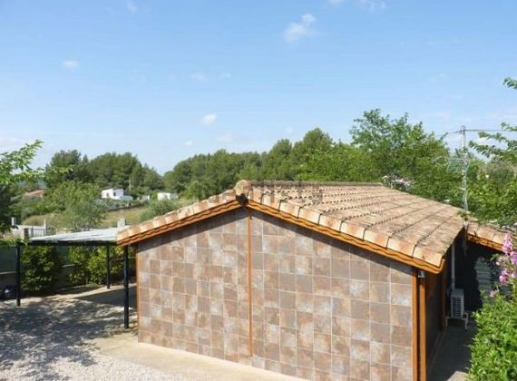 Foto 2 de Casa rural en venda a urbanización Mayor de 2 habitacions amb terrassa i piscina