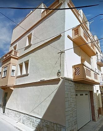 Foto 1 de Venta de casa en calle Balmes de 4 habitaciones con terraza y garaje