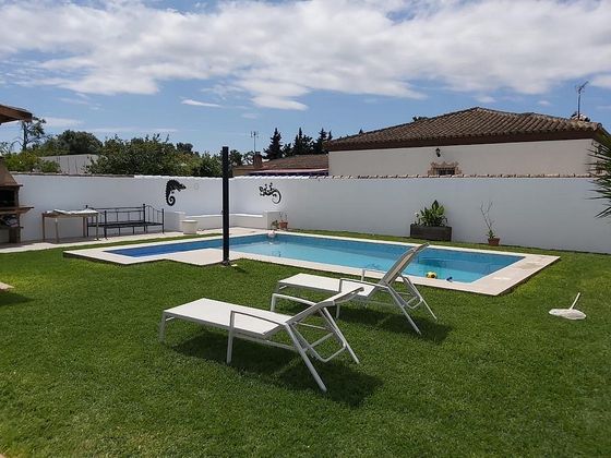 Foto 1 de Venta de chalet en calle Camino del Rey de 3 habitaciones con terraza y piscina