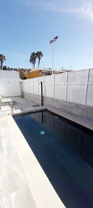 Foto 2 de Casa en venta en calle Agustín Millares Carló de 5 habitaciones con terraza y piscina