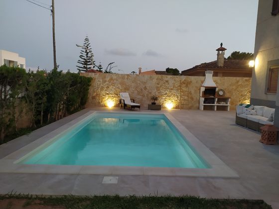 Foto 1 de Casa adosada en venta en calle Pizarro de 4 habitaciones con terraza y piscina