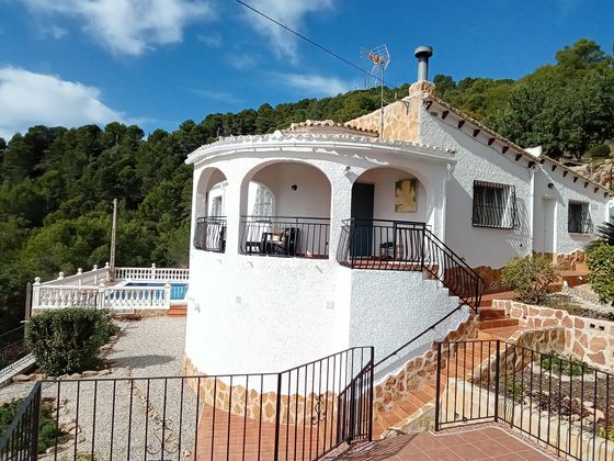 Foto 1 de Casa en venda a urbanización Tossal Gros de 4 habitacions amb terrassa i piscina