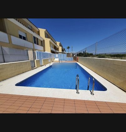 Foto 2 de Venta de casa adosada en calle Camí Ben Afelí de 3 habitaciones con terraza y piscina