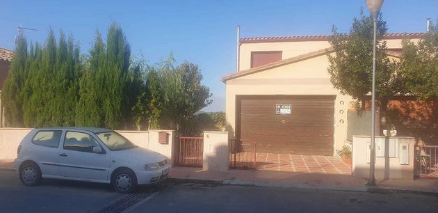 Foto 1 de Venta de casa adosada en travesía Paisos Catalans de 4 habitaciones con piscina y garaje