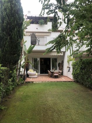Foto 1 de Casa adossada en venda a urbanización de 3 habitacions amb terrassa i piscina