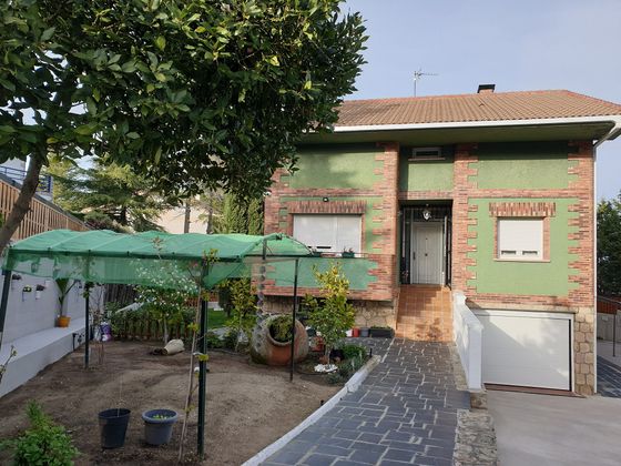 Foto 1 de Chalet en venta en avenida Valle de Guadarrama de 7 habitaciones con terraza y piscina